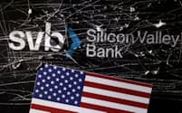 FILE PHOTO: Destroyed SVB (Silicon Valley Bank) logo and U.S. flag is seen in this illustration taken March 13, 2023. REUTERS/Dado Ruvic/Illustration/File Photo