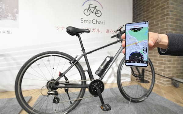 ホンダが発表した既製の自転車を電動アシスト化する「SmaChari（スマチャリ）」（29日、東京都港区）