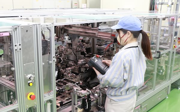 キヤノンは工場設備の自動化など生産性向上を進めている