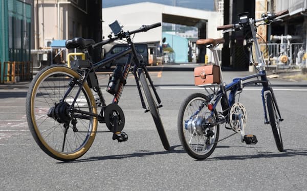 ジヤトコが電動アシスト自転車向け駆動ユニットを開発。自転車の後輪部分に配置する。写真は開発した駆動ユニットを搭載した試作車（写真：日経Automotive）
