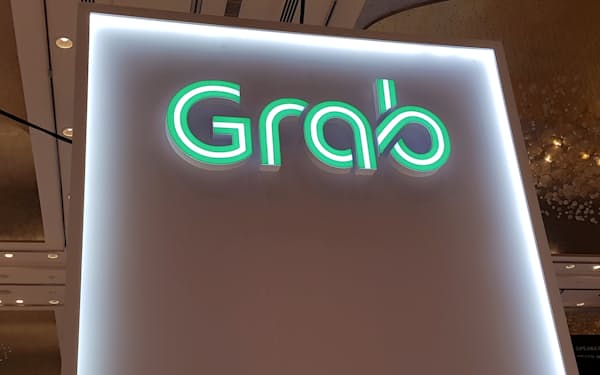 A Grab logo is pictured at the Money 20/20 Asia Fintech Trade Show in Singapore March 21, 2019. REUTERS/Anshuman Daga