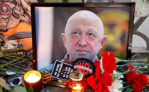 A view shows a portrait of Wagner mercenary chief Yevgeny Prigozhin at a makeshift memorial in Moscow, Russia August 24, 2023. REUTERS/Stringer A view shows a portrait of Wagner mercenary chief Yevgeny Prigozhin at a makeshift memorial in Moscow, Russia August 24, 2023. REUTERS/Stringer