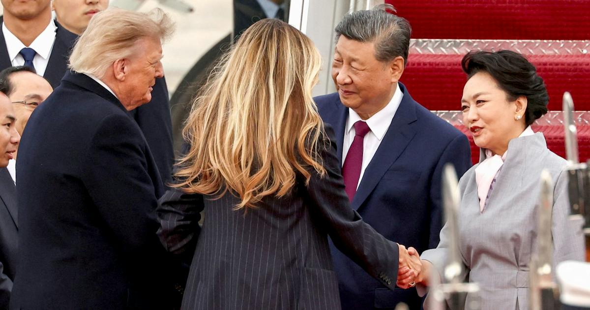 米中首脳会談、空港出迎えの裏に焦りと打算