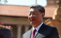 習近平国家主席は南アフリカでのBRICS首脳会議の帰路に新疆ウイグル自治区へ立ち寄った(22日、南アのプレトリア)=ロイター