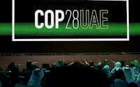 FILE PHOTO: 'Cop28 UAE' logo is displayed on the screen during the opening ceremony of Abu Dhabi Sustainability Week (ADSW) under the theme of 'United on Climate Action Toward COP28', in Abu Dhabi, UAE, January 16, 2023. REUTERS/Rula Rouhana/File Photo