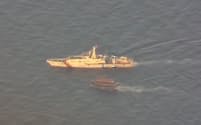 22日には南シナ海で中国船がフィリピン船に衝突した＝中国海警局・ロイター