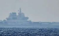 沖縄県・宮古島の南方を航行するのが確認された中国海軍の空母「山東」（防衛省統合幕僚監部提供）