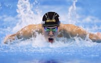 杭州アジア大会の競泳男子200メートルバタフライで金メダルを獲得した本多灯。日本の金メダルは５個にとどまった＝共同