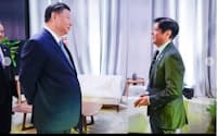 フィリピンのマルコス大統領（写真㊨）が中国の習主席に南シナ海の懸念を伝えた（フィリピン大統領府のフェイスブックページ）