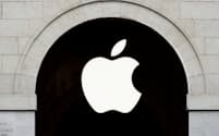 FILE PHOTO: Apple logo is seen on the Apple store at The Marche Saint Germain in Paris, France July 15, 2020.  REUTERS/Gonzalo Fuentes/File Photo