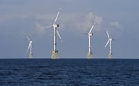 A view shows windmills of several wind farms at the so-called "HelWin-Cluster", located 35 kilometres (22 miles) north of the German island of Heligoland November 5, 2014. As European governments start to curb offshore renewable power subsidies, utilities, wind turbine makers and installers are racing to cut costs to help the industry survive. Britain, Germany and the Netherlands, wary of committing billions of euros when budgets are tight, have announced subsidy cuts in the past 18 months - a blow to the European offshore wind industry which employs nearly 60,000 people. This has led the European Wind Energy Association (EWEA) to slash its forecasts for installed offshore capacity in Europe. However, utilities remain keen to invest in offshore wind - which the EWEA says is the fastest-growing power technology in Europe. To match story RENEWABLES-WINDPOWER/OFFSHORE      Picture taken November 5, 2014.   REUTERS/Fabian Bimmer (GERMANY - Tags: ENERGY ENVIRONMENT)