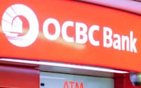 OCBC Bank and UOB automated teller machines are seen next to each other in Singapore October 8, 2019. Picture taken October 8, 2019. REUTERS/Feline Lim