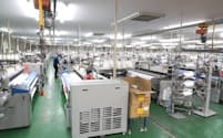 丸井織物は石川県七尾市の工場を含むすべての拠点で生産を再開した（9日、石川県中能登町）