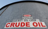 FILE PHOTO: A sticker reads crude oil on the side of a storage tank in the Permian Basin in Mentone, Loving County, Texas, U.S. November 22, 2019. Picture taken November 22, 2019.   REUTERS/Angus Mordant/File Photo
