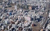北九州市の人口は1979年の106万8000人をピークに減少が続く（商業施設やオフィスビルが集まる小倉エリア）