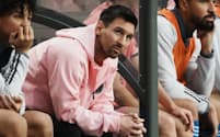 Soccer Football - Friendly - Hong Kong v Inter Miami - Hong Kong Stadium, Hong Kong - February 4, 2024 Inter Miami's Lionel Messi looks on from the substitutes bench REUTERS/Lam Yik