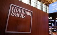 FILE PHOTO: The logo for Goldman Sachs is seen on the trading floor at the New York Stock Exchange (NYSE) in New York City, New York, U.S., November 17, 2021. REUTERS/Andrew Kelly/File Photo