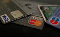 FILE PHOTO: FILE PHOTO: Bank debit and credit cards are photographed in this illustration picture at an office in Frankfurt, Germany, March 17, 2016.    REUTERS/Kai Pfaffenbach/File Photo/File Photo