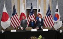 Treasury Secretary Janet Yellen, center, with Minister of Finance Shunichi Suzuki of Japan, left, and Minister of Economy and Finance Sangmok Choi of South Korea, right, pose for a picture before the start of a trilateral meeting at the U.S. Treasury Department building, Wednesday, April 17, 2024, in Washington. (AP Photo/Manuel Balce Ceneta)