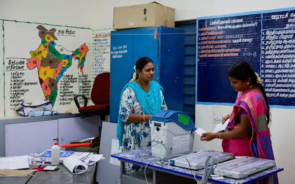 Polling officials work to set up a polling station at a school, a day ahead of the first phase of the election, at Tiruvannamalai in Tamil Nadu, India, April 18, 2024. REUTERS/Navesh Chitrakar