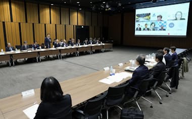 開催された新型インフルエンザ等対策推進会議（24日午前、東京都港区）=共同