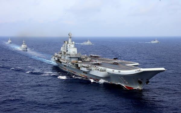 China's aircraft carrier Liaoning takes part in a military drill of Chinese People's Liberation Army (PLA) Navy in the western Pacific Ocean, April 18, 2018. Picture taken April 18, 2018. REUTERS/Stringer ATTENTION EDITORS - THIS IMAGE WAS PROVIDED BY A THIRD PARTY. CHINA OUT.     TPX IMAGES OF THE DAY