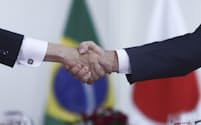 Brazilian President Luiz Inacio Lula da Silva, right, and Japan's Prime Minister Fumio Kishida shake hands during a meeting at Planalto presidential palace in Brasilia, Brazil, Friday, May 3, 2024. (AP Photo/Luis Nova)