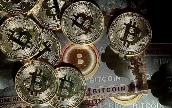 FILE PHOTO: Representations of cryptocurrency Bitcoin are seen in this illustration picture taken in Paris, France, March 9, 2024. REUTERS/Benoit Tessier/Illustration/File Photo