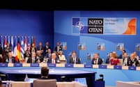 新目標を決めたNATO首脳会議(25日、ハーグ)=ロイター
