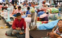 タイとカンボジアの軍事衝突を受け、避難したタイの住人ら(29日、タイ東北部ブリラム県)=高橋鈴撮影
