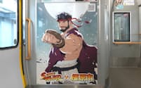 JR西日本の列車内に描かれた「ストリートファイター」のキャラクター「リュウ」