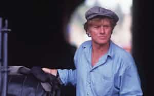 FILE - Director Robert Redford appears on set during the filming of "A River Runs Through It," near Livingston, Mont., on June 17, 1991. (Linda Best/Bozeman Daily Chronicle via AP, File) FILE - Director Robert Redford appears on set during the filming of "A River Runs Through It," near Livingston, Mont., on June 17, 1991. (Linda Best/Bozeman Daily Chronicle via AP, File)
