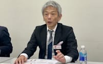 記者会見するムービン・ストラテジック・キャリアの神川貴実彦社長(6日、東京都中央区)