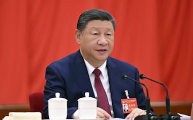 習近平国家主席は4中全会で「鉄の腕で腐敗と闘う」と表明した(北京)=新華社・共同