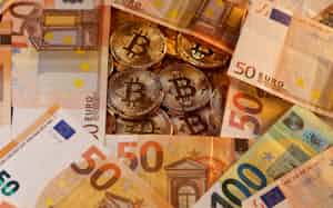 FILE PHOTO: Representations of virtual currency Bitcoin and euro banknotes are seen in this picture illustration taken January 27, 2020. REUTERS/Dado Ruvic/Illustration/File Photo FILE PHOTO: Representations of virtual currency Bitcoin and euro banknotes are seen in this picture illustration taken January 27, 2020. REUTERS/Dado Ruvic/Illustration/File Photo
