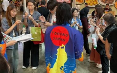 東経連はタイで開催された総合食品見本市に出展して東北地方や新潟県のコメをPRした=東経連提供