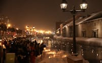 幻想的な運河の光景が外国人観光客を魅了。「小樽雪あかりの路」（写真:japan-guide.com）