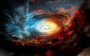 銀河系の中心にある超大質量ブラックホールの想像図。（PHOTOGRAPH BY NRAO, AUI, NSF）
