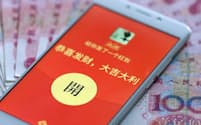 中国ではテンセントなどの決済サービスを通じた「デジタルお年玉」が普及　（写真:Imaginechina/アフロ）
