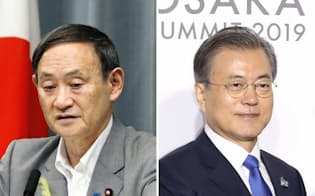 菅官房長官(左)と韓国の文在寅大統領=共同