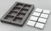 図6 IMJが新製法のPLPで量産するネオジム磁石。磁粉は、型に入れて焼結する。切削加工が不要なので材料歩留まりが高い