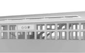 リニア新幹線の中間駅の斜めからの外観透視図。周辺の状況に応じて、明かりフードや防音壁などを設ける。高架下部分には実際の様態に応じて外装を施す（資料:JR東海）