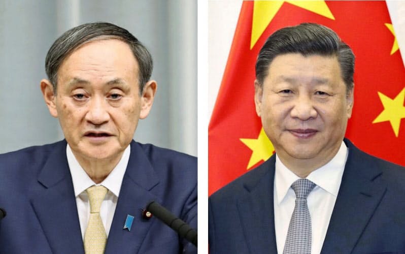 菅義偉首相が中国の習近平国家主席と初めて電話で協議した(共同) 菅義偉首相が中国の習近平国家主席と初めて電話で協議した(共同)