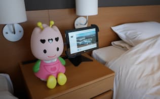 写真7 部屋ごとに1台の案内ロボ「ちゅーりー」が設置されている