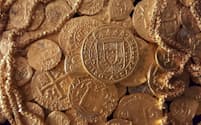 1715年にフロリダ沖で沈没したスペインの輸送船から見つかった金貨。（PHOTOGRAPH BY 1715 FLEET - QUEENS JEWELS, LLC）