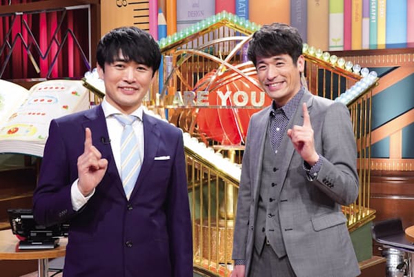 MCは劇団ひとり(左)と佐藤隆太。「ジャンルとしてはプレッシャークイズなので、追い詰めるようにほどよくあおるのが上手な劇団ひとりさんに司会をお願いしました」と関口氏。隣に誰がいたらほっこりするかなと考えて笑顔が印象的だった佐藤にオファーをしたという MCは劇団ひとり(左)と佐藤隆太。「ジャンルとしてはプレッシャークイズなので、追い詰めるようにほどよくあおるのが上手な劇団ひとりさんに司会をお願いしました」と関口氏。隣に誰がいたらほっこりするかなと考えて笑顔が印象的だった佐藤にオファーをしたという