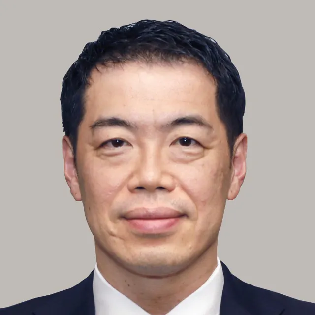 新谷 正義