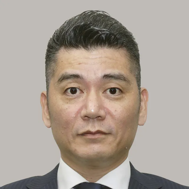 津田 賢伯
